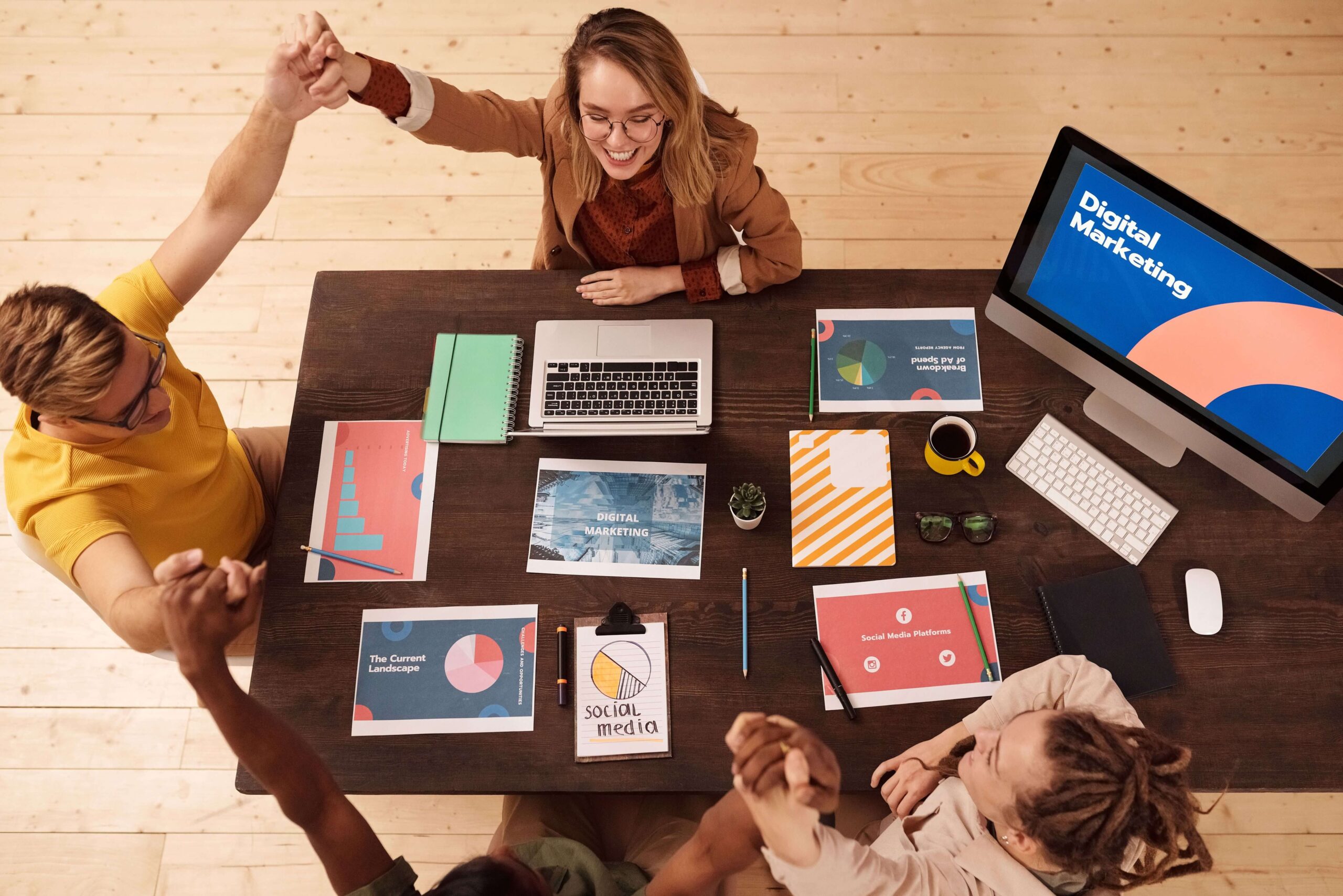 a team of people work in office